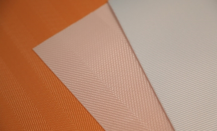 What advantages do industrial filtration cloths after the calendering process?